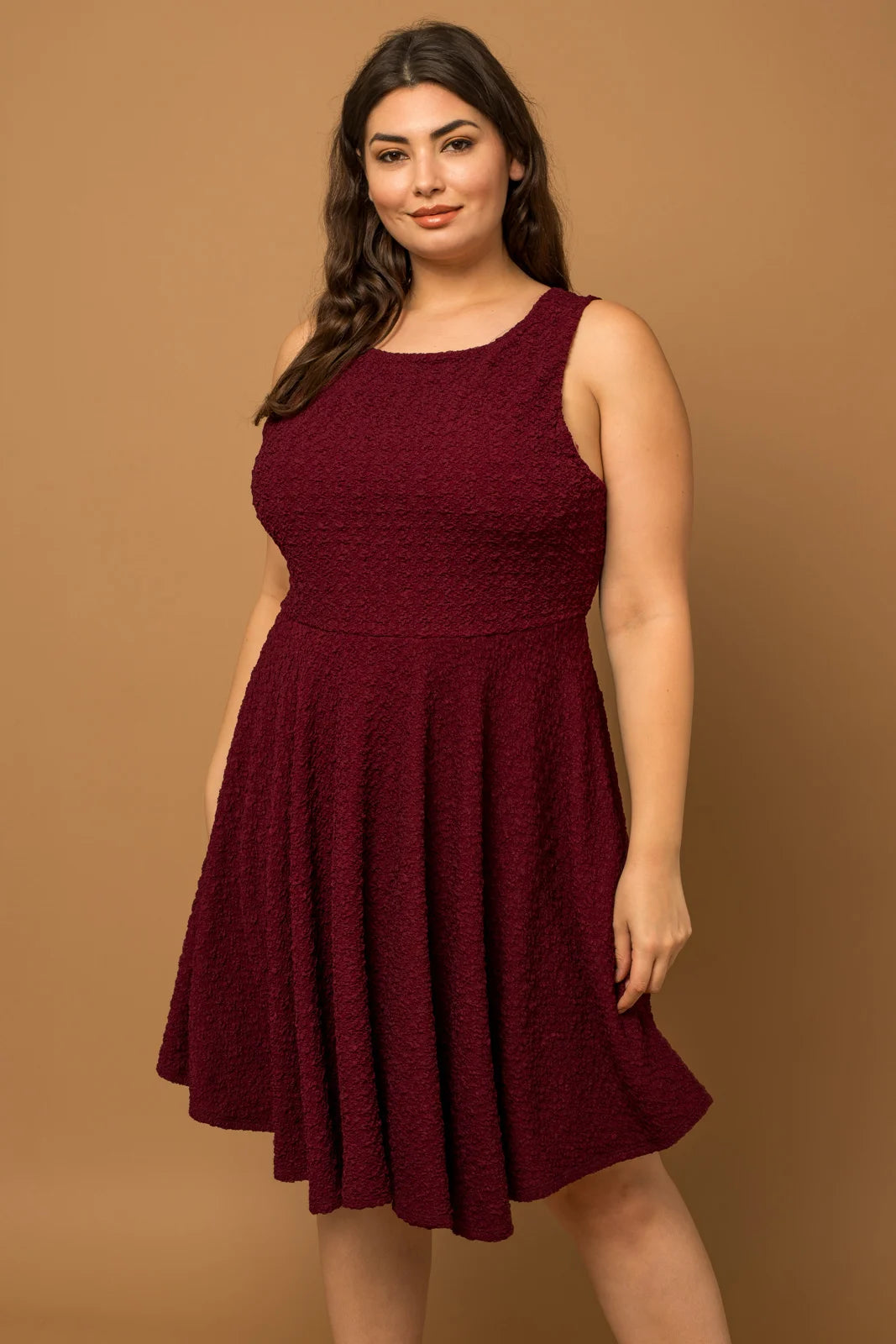 Plus size dresses with sleek silhouettes look sharp -Plus Size Texture Sleeveless Scoop Neckline Mini Dress