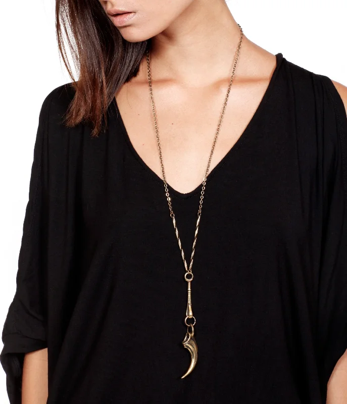 Simple necklaces and pendants with tiny charms for a delicate and casual vibe-tiger talon pendulum necklace brass