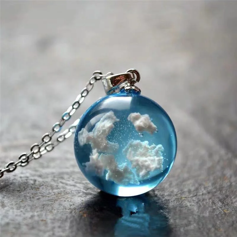 Stunning necklaces and pendants with aquamarine stones for a serene effect-Wholesale Blue Sky and White Clouds Transparent Spherical Resin Pendant Creative Necklace