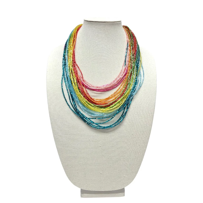 Stunning necklaces and pendants with turquoise and gold for a vibrant, earthy look-Necklace Layered By Clothes Mentor