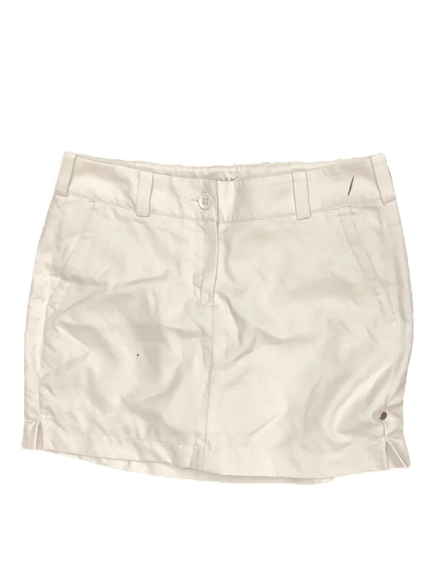 Sports pants featuring earthy tones are grounding -Athletic Skort By Nike In Beige, Size: 8