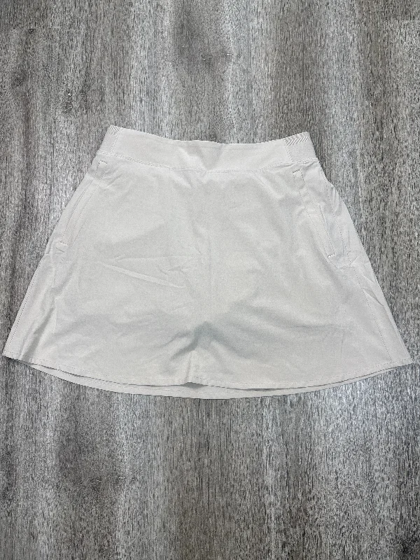 Sports pants with zippered pockets stay practical -Athletic Skort By Athleta In Beige, Size: M