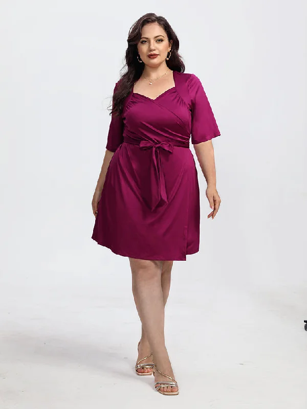 Plus size dresses featuring neutral tones pair easily -Plus Crisscross Ruched Belted Half Sleeve Party Dress