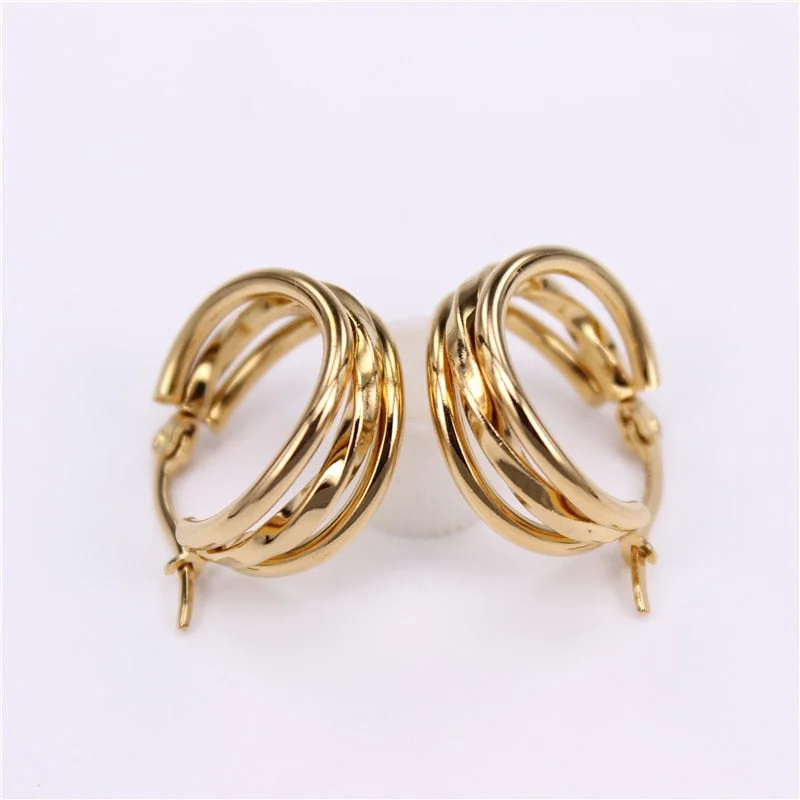 Hoop earrings with oversized pearl accents for a statement-making look-Classic three rings Features earrings